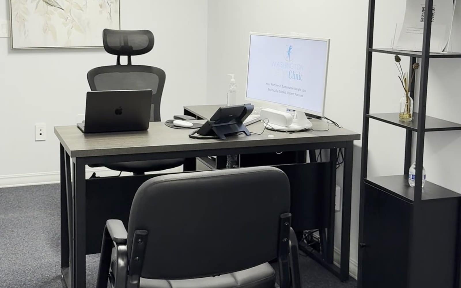 The consultation room at Washington Trim Clinic, with a desk and two chairs where your first visit takes place.